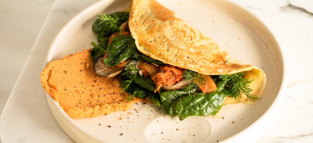 A freshly cooked omelette on a plate
